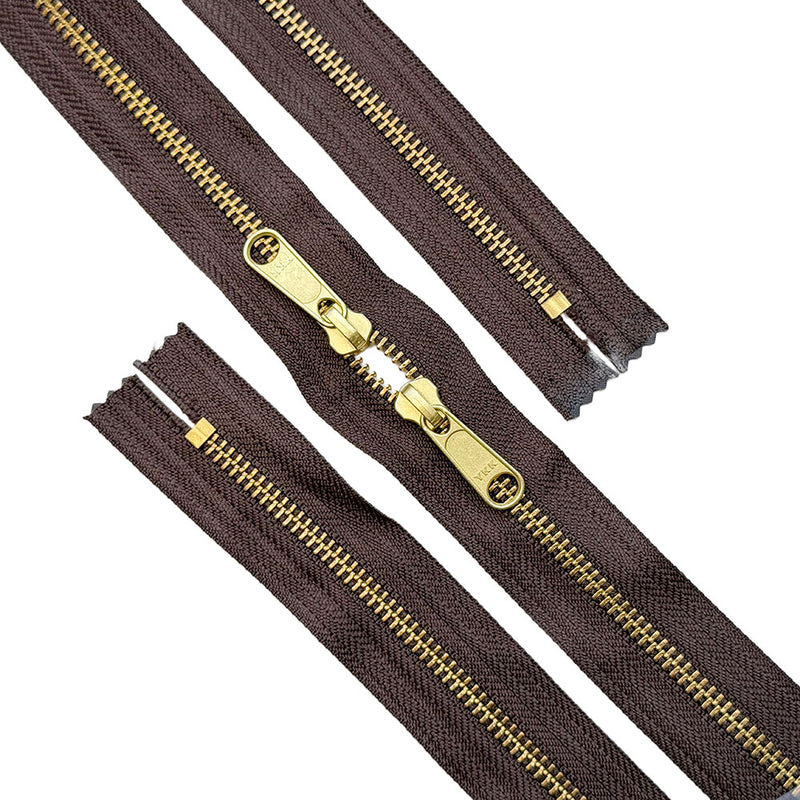 YKK #5  Brass Closed Top / Closed Bottom with Two Non Locking Long Pull Sliders meeting in the middle head-to-head.